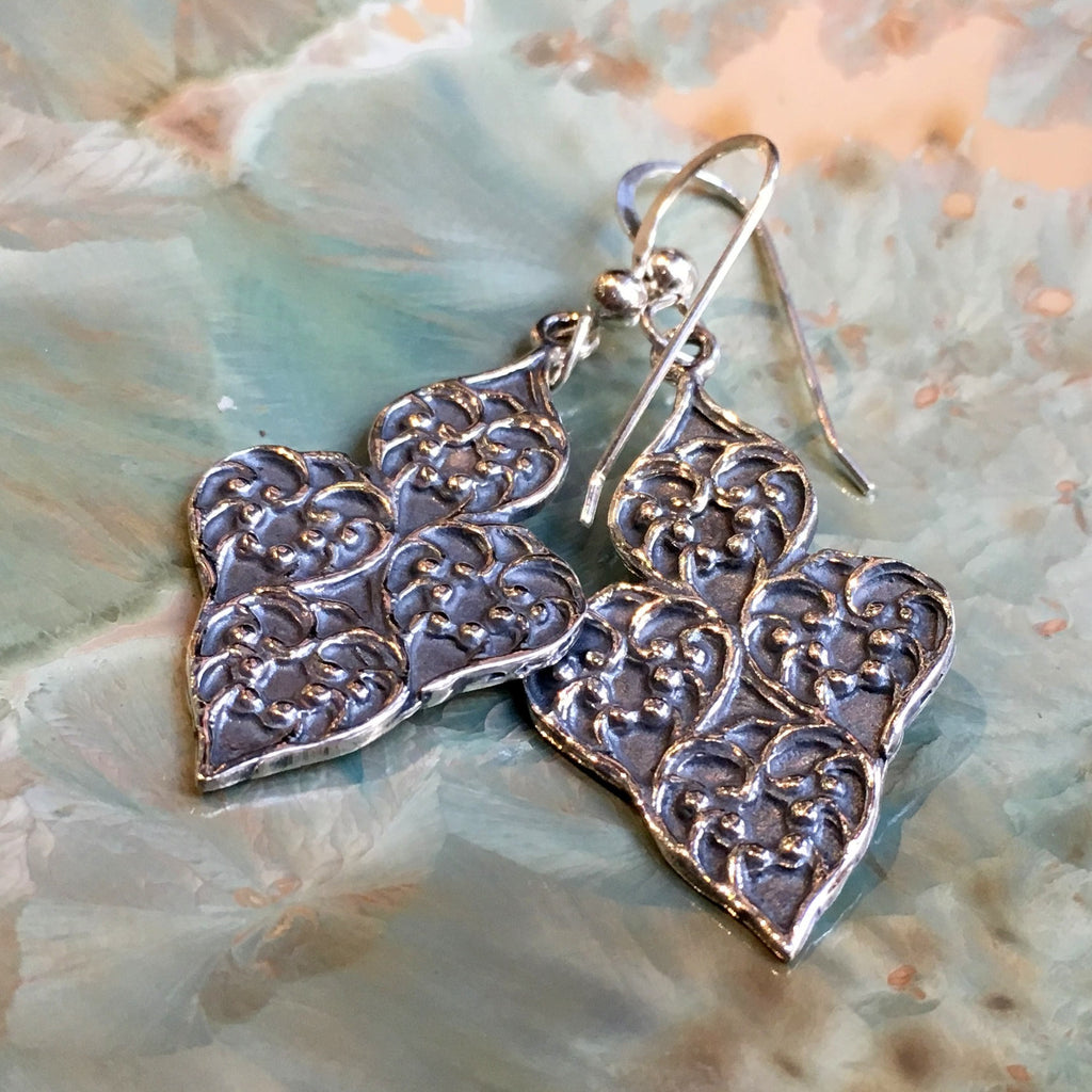 Antiqued Silver Earrings with Stamped Floral Coin – Rustica Jewelry